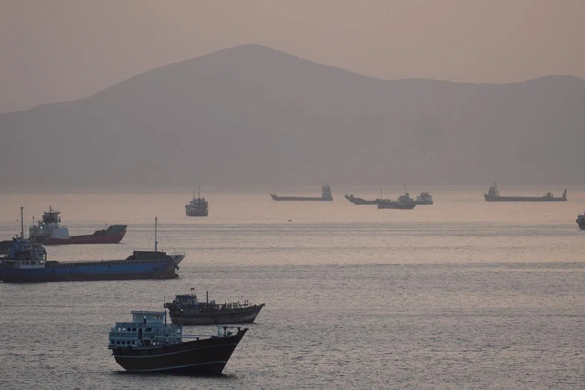Trump says US to help ships stranded in Strait of Hormuz as tanker hit by projectiles