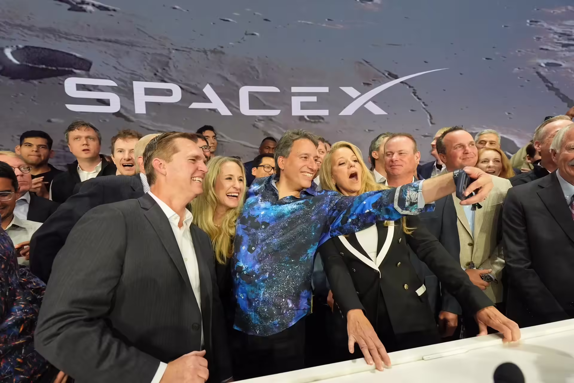 SpaceX shares rise 11% in strong Nasdaq debut after $75 billion IPO